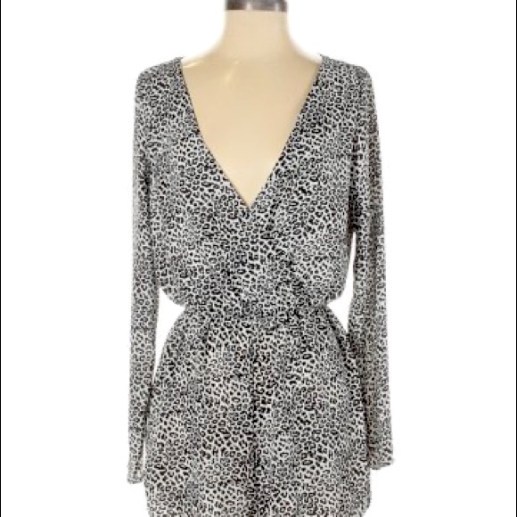 Urban Outfitters Pants - Urban Outfitters Deep Plunge Zebra Print Romper